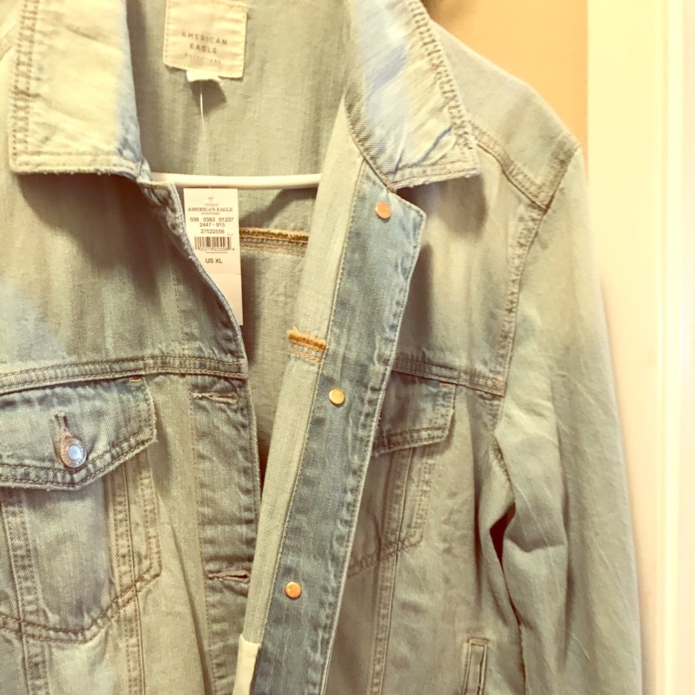 Distressed denim jean jacket